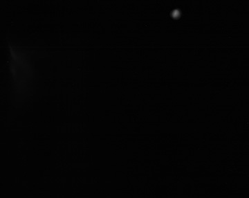 Light starting to shine at the black square (~1998).